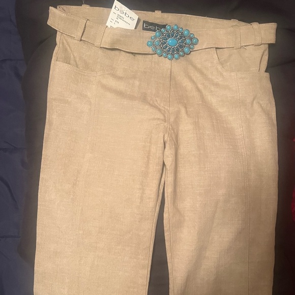 Bebe Designer pants. Straight leg, slightly flared with turquoise studded belt. - Picture 8 of 10